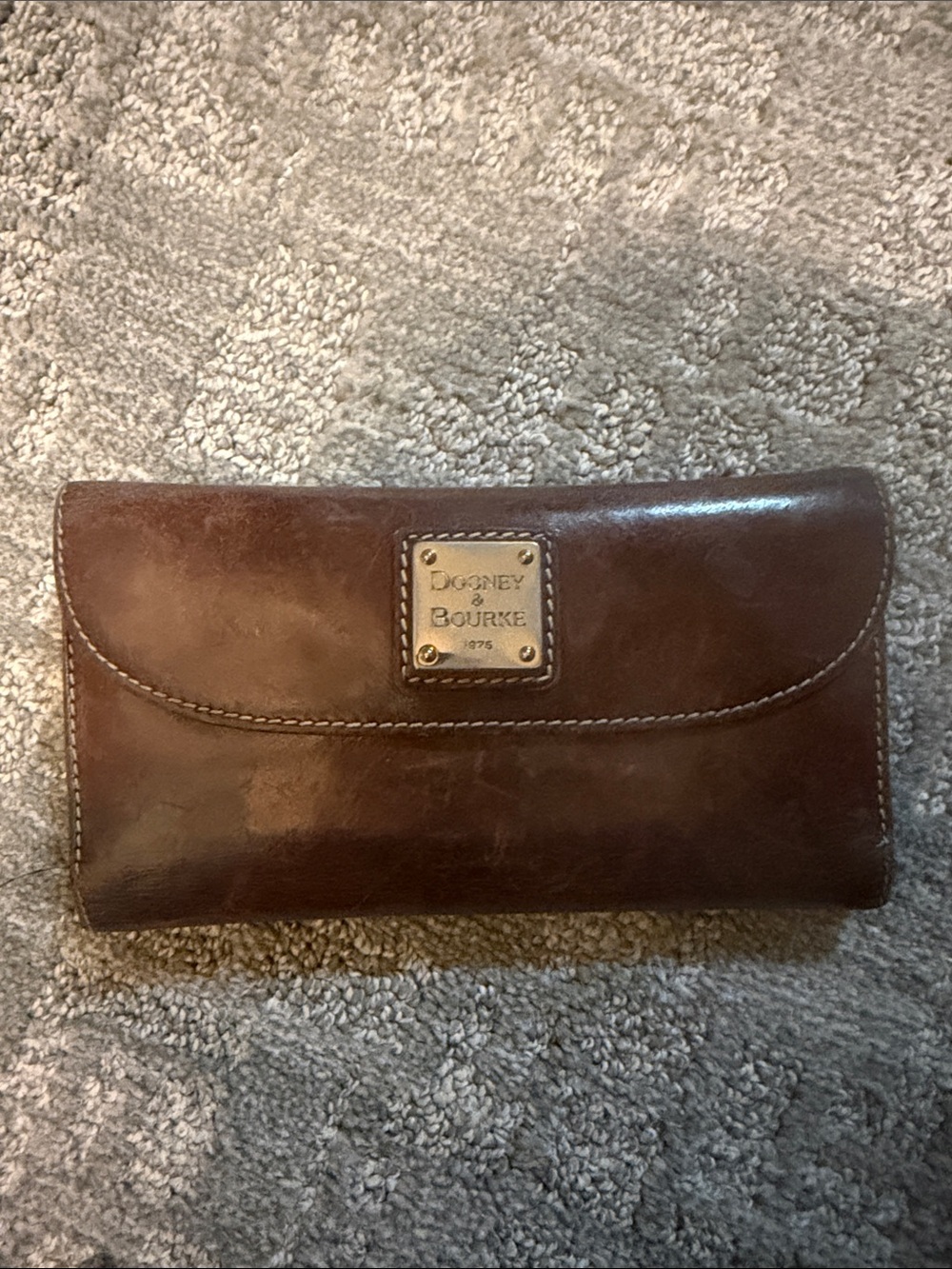 Dooney & Bourke Dark Brown Leather Wallet with Brass Plaque